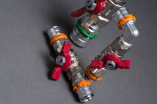 istock Water valves with fittings on grey 547052126