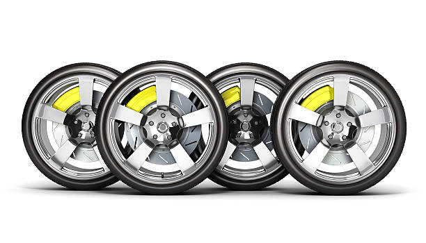istock Car wheels with brake isolated on white background 3d 547052586