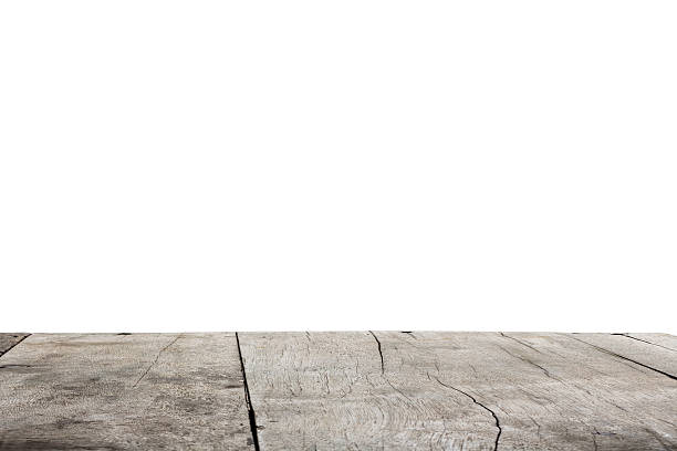 istock Old wood table top isolated on white background 547053392