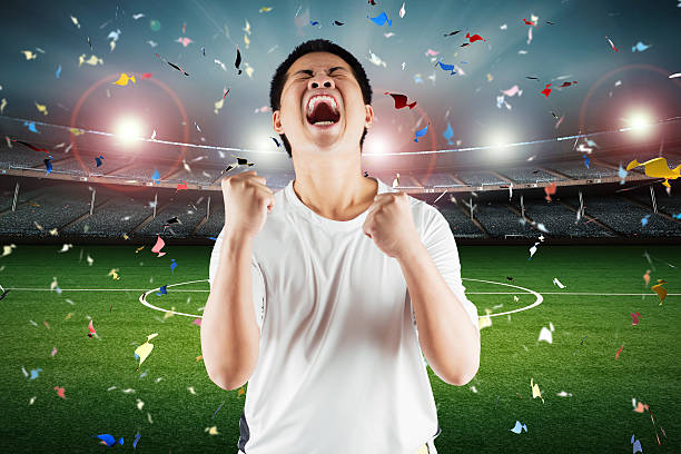 istock soccer fan celebration 547054188