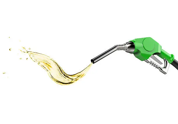 green gas pump nozzle with oil drop on white background