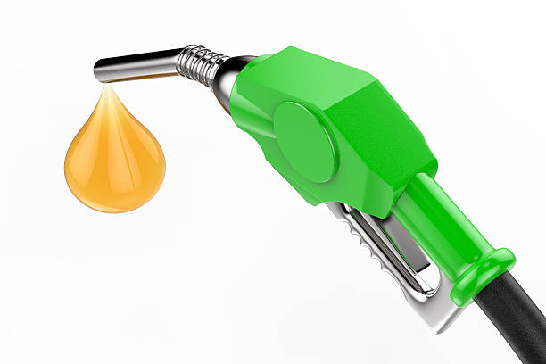 istock green gas pump nozzle with oil drop 547056100