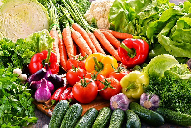 istock Composition with variety of fresh organic vegetables 547056236
