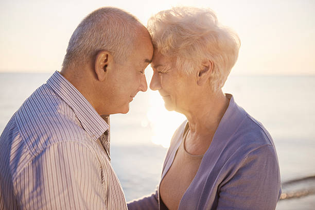 istock Senior couple standing face to face 547123666