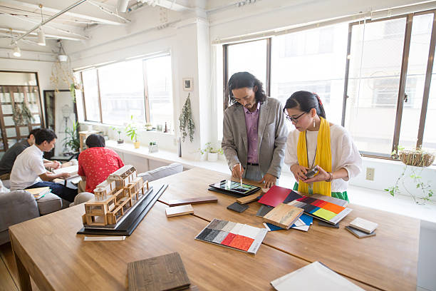 istock Interior designers working in an architectural firm 547129094