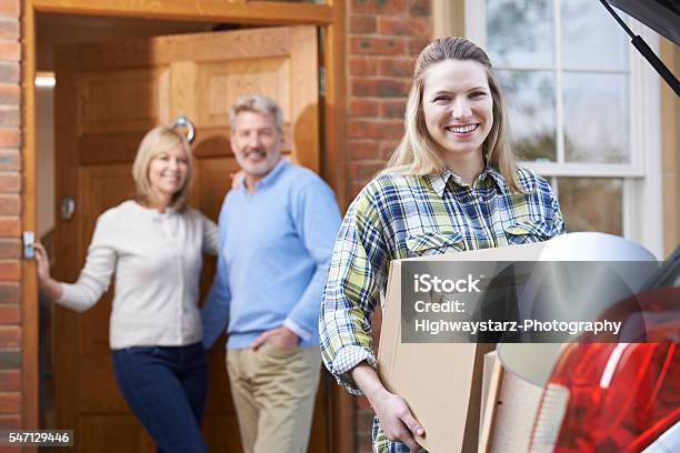 Adult Daughter Moving Out Of Parents Home Stock Photo - Download Image Now - University, Parent, Leaving