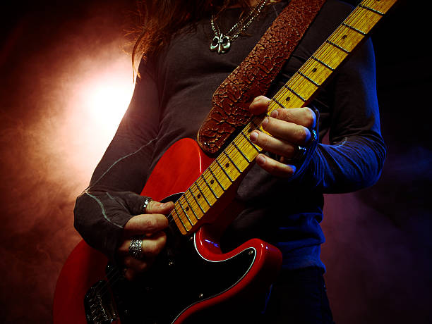 istock The guitarist plays solo. 547130984
