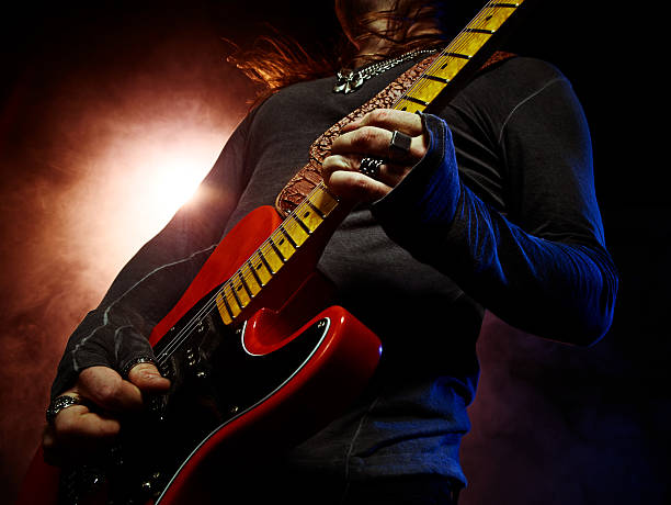 istock The guitarist plays solo. 547131124