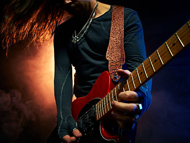 istock The guitarist plays solo. 547131476
