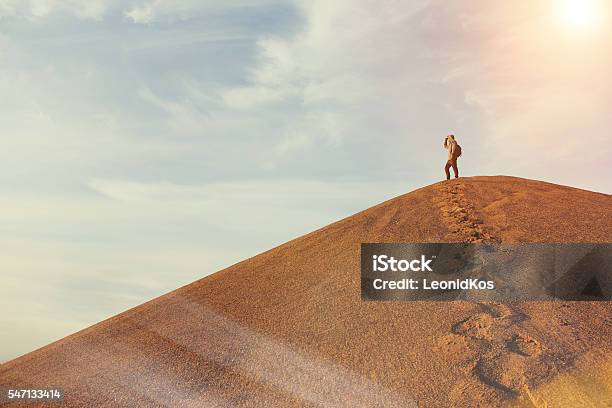 Man On Top Of A Dune In The Desert Stock Photo - Download Image Now - Desert Area, Explorer, Footprint
