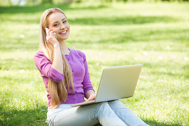 istock Beautiful young woman at garden 547133854
