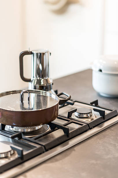istock Modern kitchen burner with pot and caffettiera 547134438