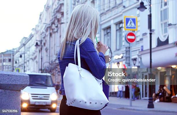 Young Woman Drinking Coffee Stock Photo - Download Image Now - Adult, Bag, Beautiful People