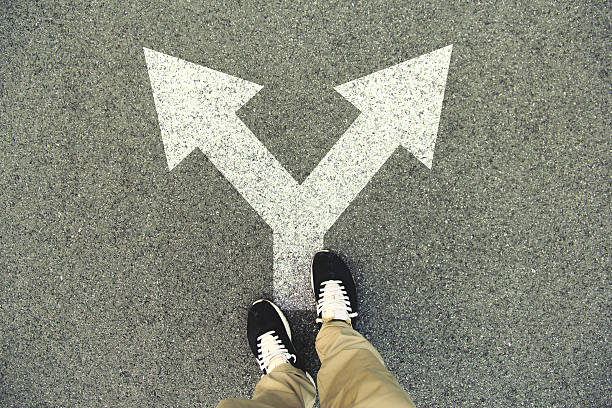 istock Double arrow painted on an asphalt road 547137288