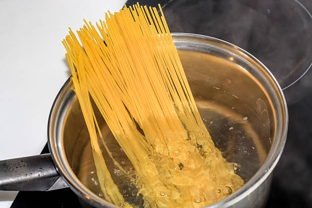 istock boiling spaghetti noodles in the pot 547137724