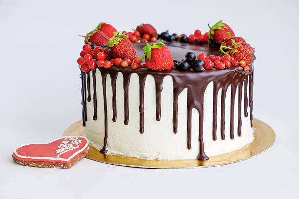 istock birthday cake decorated by chocolate and berry 547138612