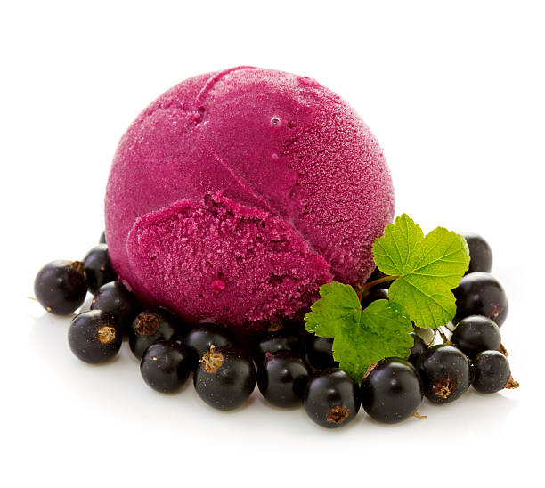 istock Ice cream and fresh black currants. 547138684