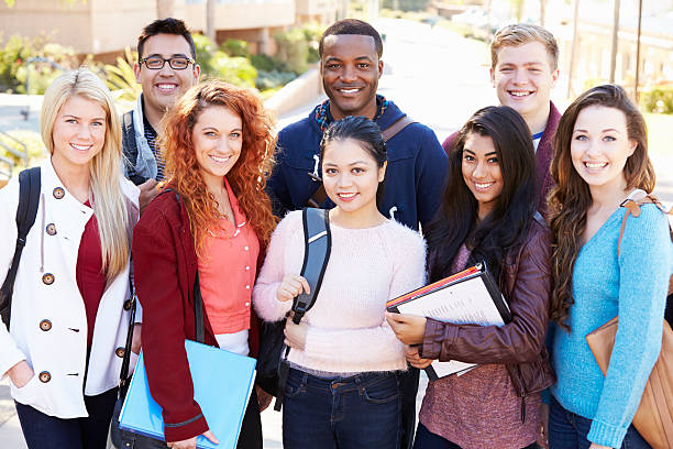 istock Portrait Of University Students Outdoors On Campus 547139376