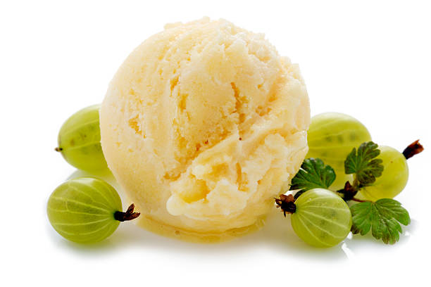 istock Vanilla ice cream and fresh gooseberries. 547140252