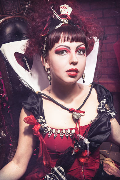 istock Red Queen of Hearts Sitting on Throne 547142056