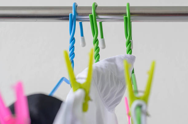 istock white shirts drying on a clothes line. 547142200