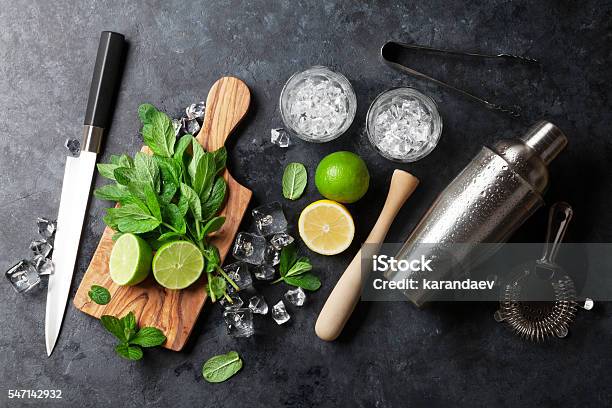 Mojito Cocktail Making Stock Photo - Download Image Now - Cocktail, Cutting Board, Ingredient