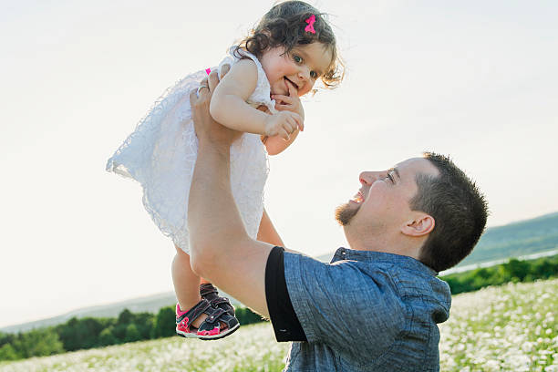 istock happy joyful father with daughter 547143436