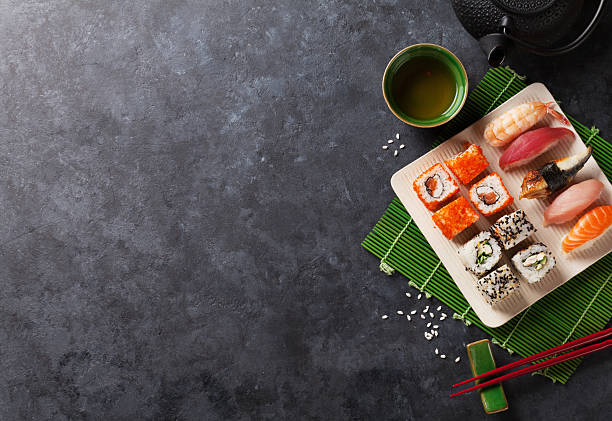 istock Set of sushi, maki and green tea 547144284