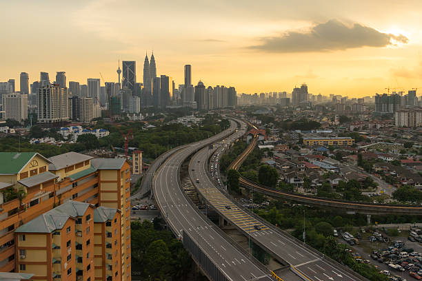 istock Dramatic sunset over Kuala Lumpur City Skyline 547145396