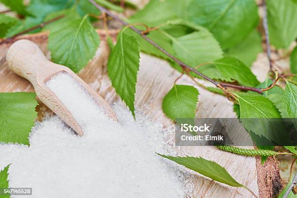 Xylitol Birch Sugar On A Birch Background Stock Photo - Download Image Now - Xylitol, Branch - Plant Part, Cooking