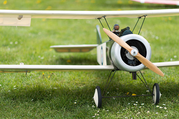 istock historic biplane model airplane on meadow 547146292