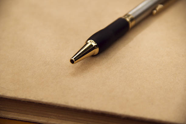 istock Close up Pen on paper, with copy space for text 547148256