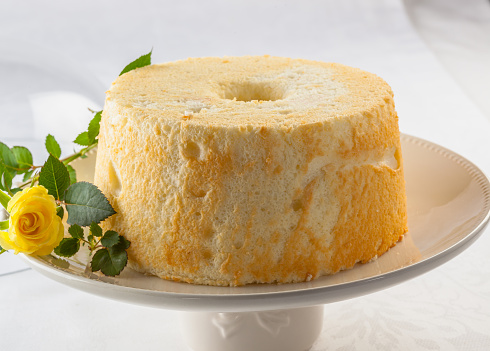 Angel food cake, or angel cake, is a type of sponge cake made with stiffly beaten egg whites with no addition of butter.