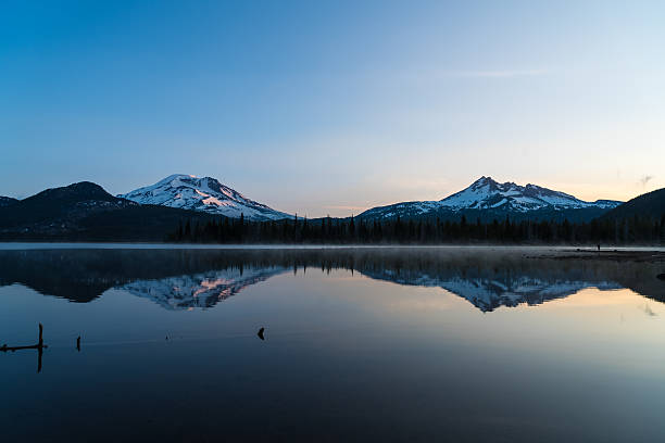 istock Serene view of mountain reflected in lake 547151624