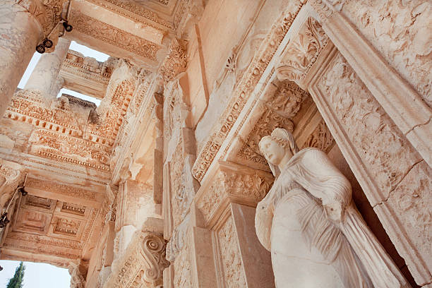 Historical Celsus Library of Ephesus city, 10th century BC Ceiling of historical Celsus Library of Ephesus city with antique sculpture at entrance, Turkey. Greek city Ephesus founded on 10th century BC. celsus library photos stock pictures, royalty-free photos & images