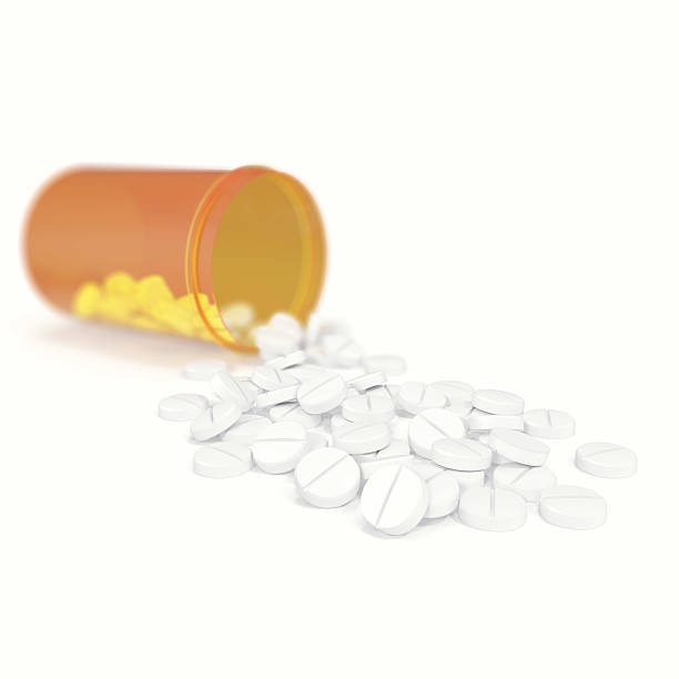 istock Pill bottle spilling pills isolated on a white background. 3d 547154670