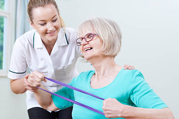istock Senior Female Working With Physiotherapist 547155722