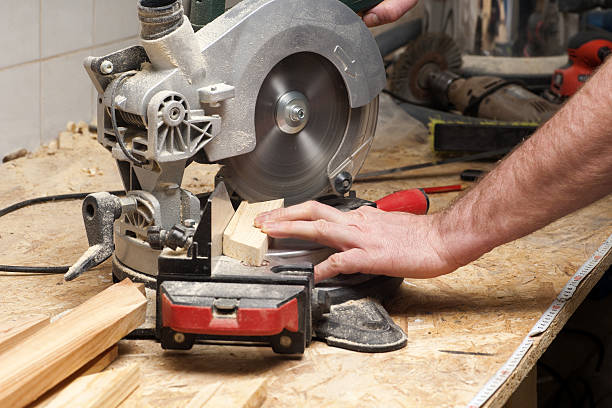 istock Carpenter working. Carpenter tools on wooden table with sawdust. 547158836