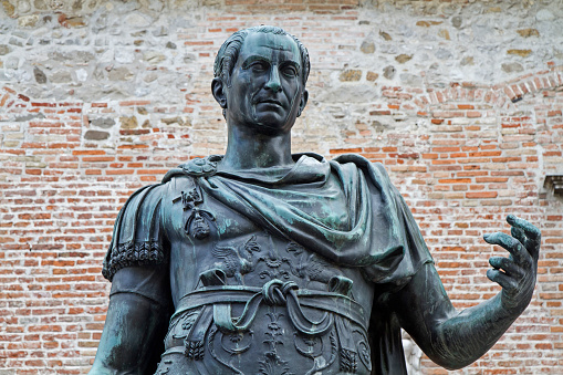 Statue of the city founder Julius Caesar before the City Council in Cividale del Friuli
