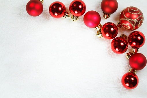 Christmas balls  on white fur background , Christmas concept