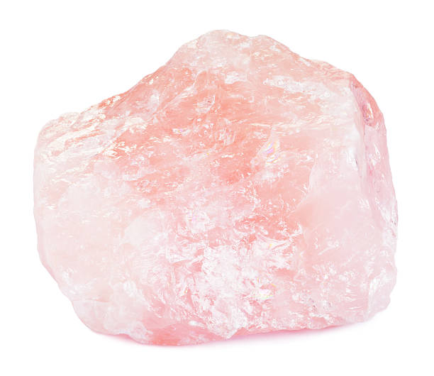 Raw pink quartz gemstone Raw pink quartz gemstone isolated on white with clipping path feldspar stock pictures, royalty-free photos & images
