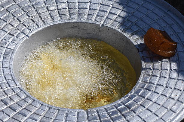 istock raw potatoes in oil 547164700