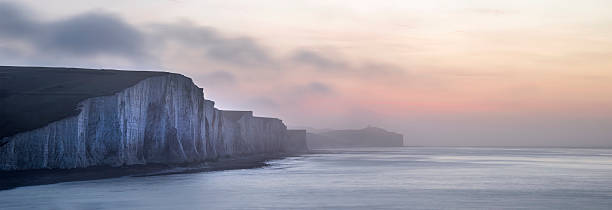 istock Panorama landscape at sunrise over Seven Sisters in South Downs 547165652