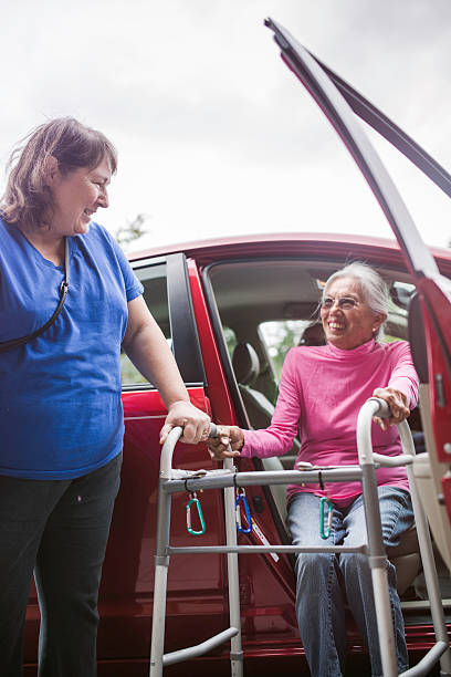 istock Disabled Senior Woman Getting a Ride 547168654