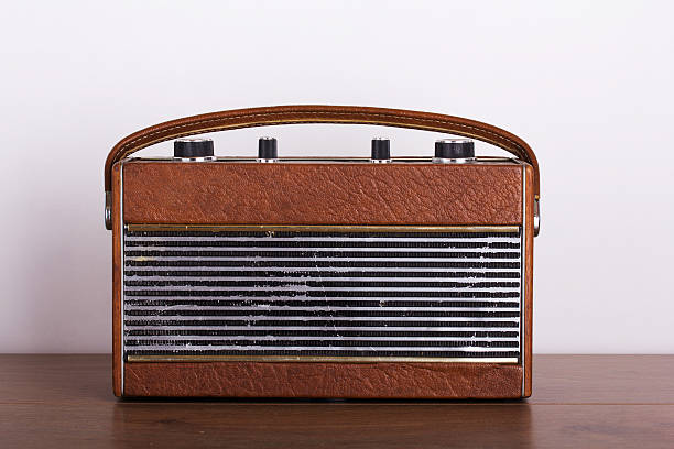 istock Old retro style radio on a wooden surface 547169008
