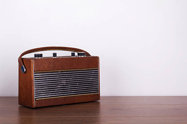 istock Old retro style radio on a wooden surface 547169022