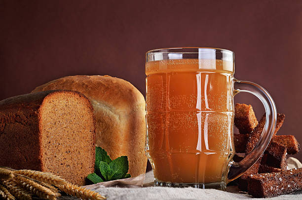 Turkish bread and glass of beer on table