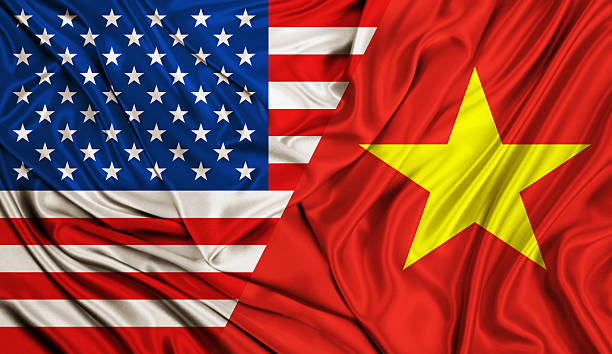 istock Wind flags - USA and Vietnam flag 547199094