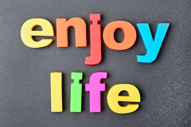 istock Enjoy life words on background 547205310