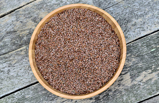 istock Flax seeds in bamboo bowl 547205530